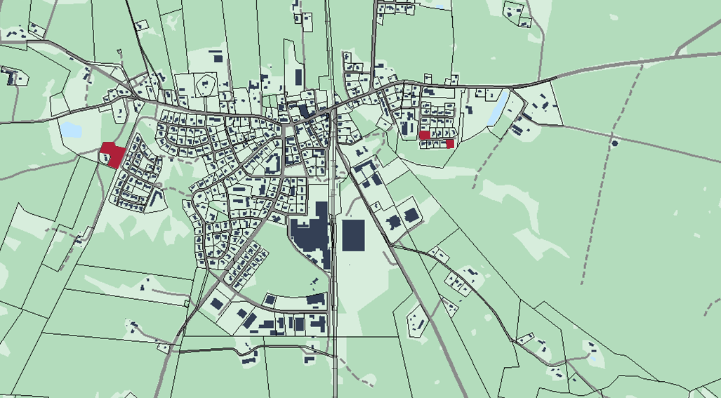 Bilden visar en kartbild över Vedum med rödmarkering var lediga tomter finns.